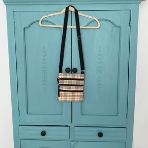 Plaid Crossbody Bag. Black Strap and zippers. 3 pockets on one side/1 on other